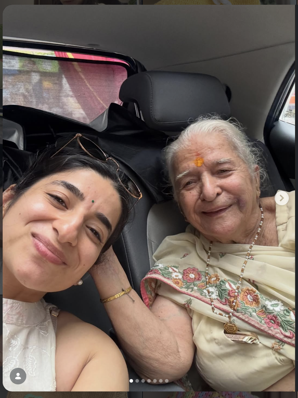 The granddaughter and her Dadi smiling together