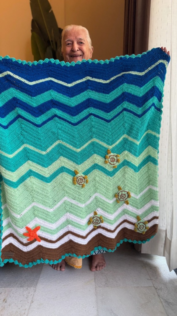 Caught Craft Handed sea-themed baby blanket Reel